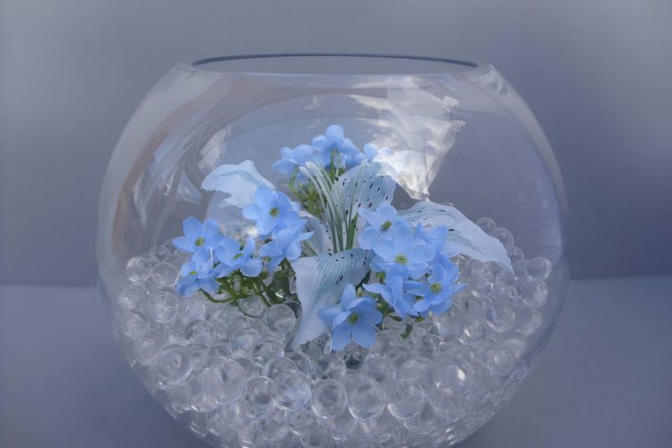Table Decoration - Goldfish bowl with Lily, Blue Orange Flower and waterbeads - from £15.00