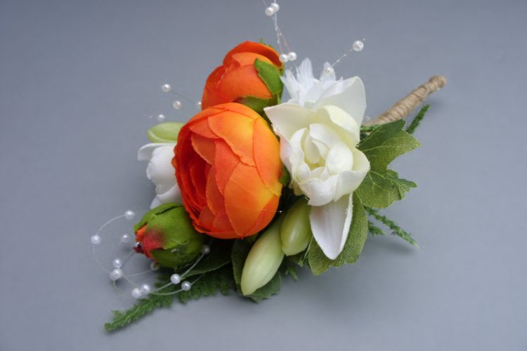 Corsage - Tuberose, Orange Ranunculus, Pearl Loop and Baby's Breath - from £9.00