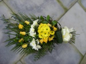 Yellow and White Funeral Sheaf using Roses and Chrysanthemums, with foliage - £77.00